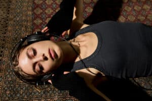 Women Laying on a Carpet